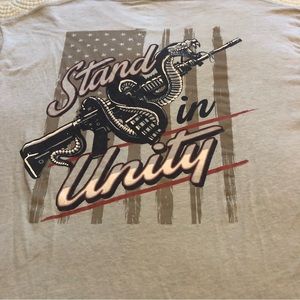 “Stand in Unity” Tee size Medium light  blue